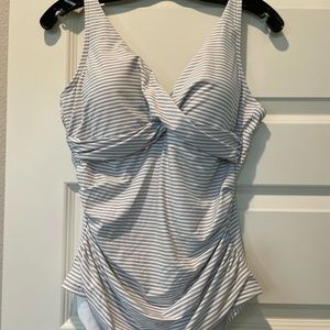 Very flattering one piece swimsuit in light gray and white stripes, size 10.